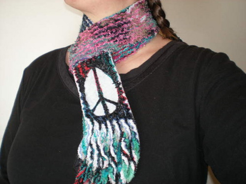 Hi, I am a reclaimed fabric artist. I take fabric from second hand clothes and by using a multi -step technique I turn it into chenille like textured scarves.