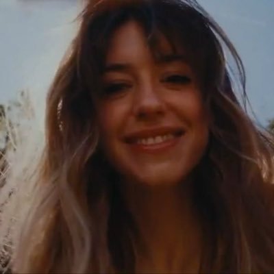 manic grin.