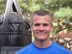 Designs extreme training programs for mass building, fat loss, and martial arts.