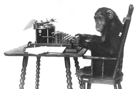 a monkey at a keyboard typing with one finger