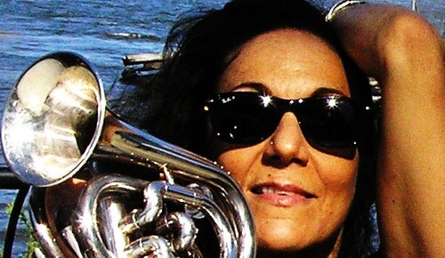 This triple-threat female powerhouse plays trumpet, sings, composes & leads her jazzy, funky band: Ginetta's Vendetta in NYC & around the world!!!