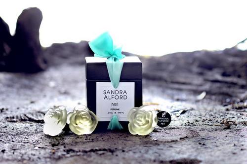 SandraAlfordNo1's profile picture. A clear, vivid scent that is elegant, yet contemporary. Sandra Alford No1 - green top notes highlight lily rose sandalwood softened by traces of moss & vanilla.