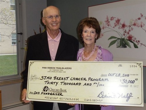 Presenting our Pink RibbonTrailblazers check to St. Joseph Mercy Oakland Breast Health Services.  Money for free Mammograms.
