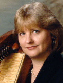 Celtic harper, composer, arranger, owner of Sylvia Woods Harp Center . . . and very happy resident of Kauai