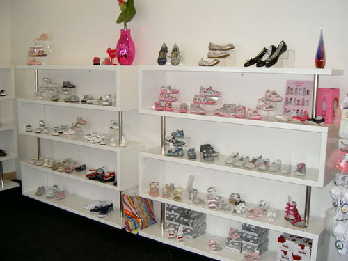 The Little Shoe Bootique, quality and designer children's shoes, from traditional white and pastel colour patent shoes to modern boots and hightops.