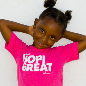 What makes these t-shirts so iconic? Is it the bright colors or the fashionable designs?
Is it the sustainable fabrics or just the simple catchy words?