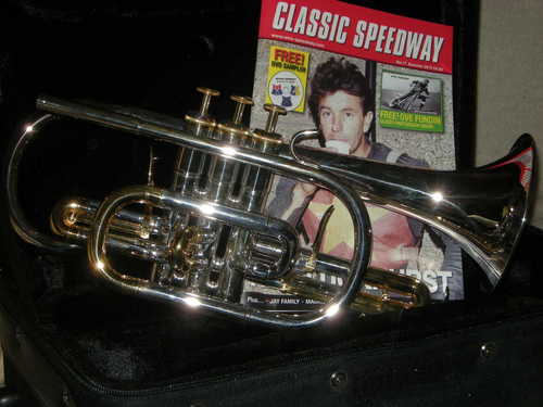 Speedway fan, marketeer, jazz fan.