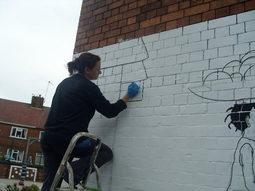 Artist specialising in exterior murals.