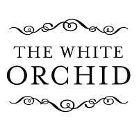 TheWhiteOrchid's profile picture. Fine Women's Apparel and Bridal Boutique in Estes Park, CO.  Creating traditions for your family and future.