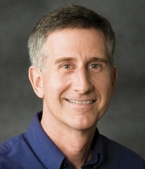 husband, father of five; editorial manager since '85; grew up in Guatemala; seven siblings; enjoy soccer, mountains, family fun