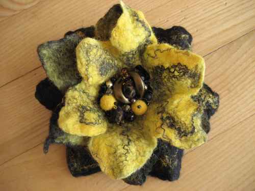 My name is Ingrida. My shop name is feltinga. I love felting! Here you can see my shop on etsy.