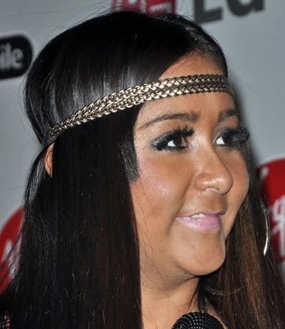Flamboyant black woman suck in a white fan girl's body. How hetero. Stay classy.