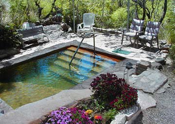 Faywood, a natural geothermal resort in southwestern New Mexico, boasts rejuvenating outdoor mineral water baths for soaking.