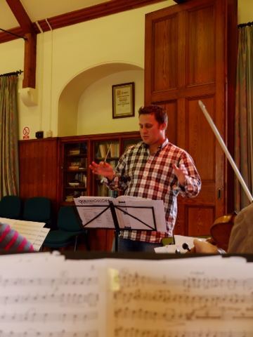 Trombonist, Conductor, football groundsman, gardener :)