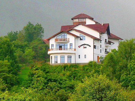 Beyond your ...expectations Hotel, restaurant, and conference room. Transylvanian Inn offers magnificent views over Dracula Castle,Bran Village,Carpathians