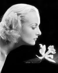 Former journalist, writer forever, nature lover, merry prankster, member of the Resistance since 2015, music is life, collector of Carole Lombard (pictured).