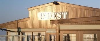 ,,It's all about Woest - Geniet met ons mee en hoor het laatste Woeste nieuws het eerst! -