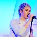 i think niall horan is one sexy irsh boy and who ever thinks he cant sing .... you can go die in a whole  (: