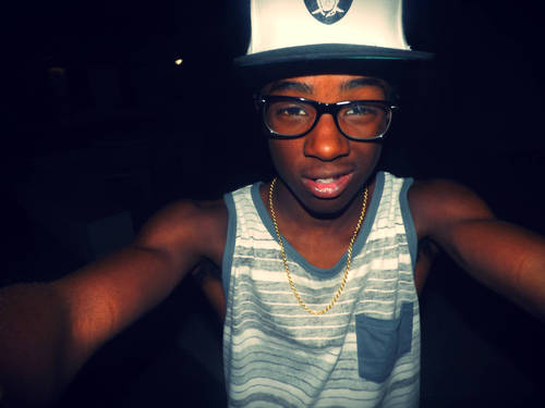 Well im black/indian i listen to wiz khalifa and i play basketball and do photography..