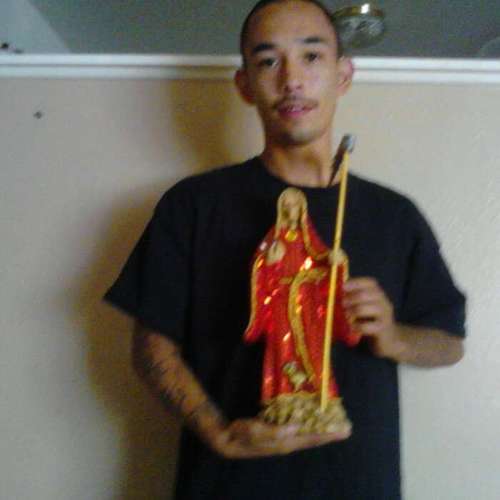 In it to win it running from the law cuz of the money im spendin.oh jea creo en la santa muerte so if your down follow me if your a square keep it movin.