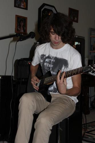 Hey guys, I'm Andrew, guitarist/vocalist for @StillIRiseBand! Check out our music on Facebook! http://t.co/aaA8xE99y1