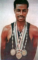 Abebe Bikila (አበበ ቢቂላ) (August 7, 1932– October 25, 1973) was a two-time Olympic marathon champion from Ethiopia. A stadium in Addis Ababa is named in his honor
