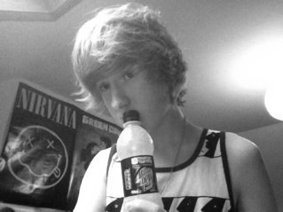 Asking_Elliot's profile picture. Boobs, Food, Metal, Mosh pits, Double pedal drums, Heavy drops, Ridiculous guitar solos, Tattoos, Screaming like a bitch forever. Life.