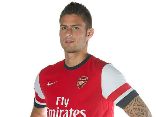 Very happy Frenchman of whom has just signed for Arsenal football club