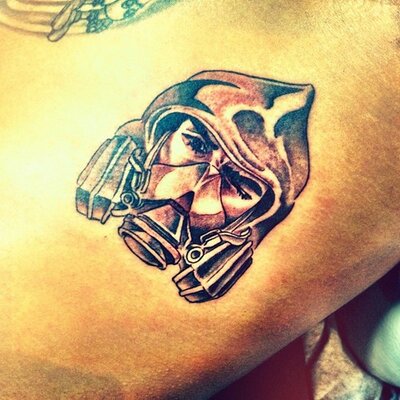 Chris Brown shocks fans as he unveils a massive Venus De Milo tattoo on the  back of his head - Mirror Online