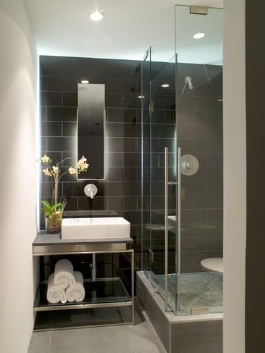 Glass and Mirror Pros - Central Florida's One Stop Shop for Glass Shower Enclosures, Mirrors, Window Glass Repair and Glass Table Tops. Call (407) 476-4130