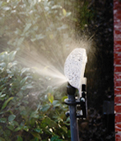 Protect your property from water sprinkler overspray. Sprinkler Shield diverts water overspray back onto your yard away from fences, stucco walls and windows