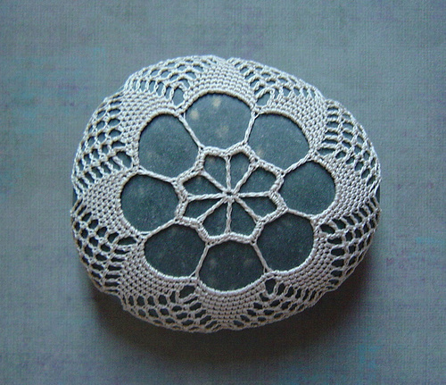 Crocheted lace stone creator.