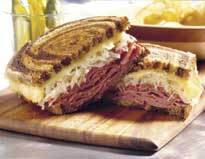TheReuben's profile picture. Grilled or toasted sandwich made with corned beef, sauerkraut, Swiss cheese, and Russian dressing