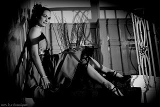 Burlesque performer, founder of Burlesque Dreams Presents and co-promoter of Barnsley Burlesque Extravaganza, champagne drinking, swimming, modern pin-up girl