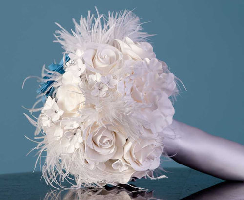 Wedding bouquets, boutonnieres and floral accessories from clay, feathers and brooches. Offering jeweled bridal and prom accessories. I ship worldwide!