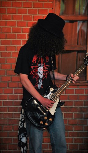 Playing the guitar, the drums and the marimba, watching anime, and doing functional programming to make the world a better place!