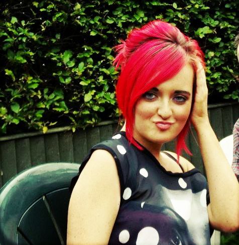 18. 
BRIGHT pink hair. That will do :)