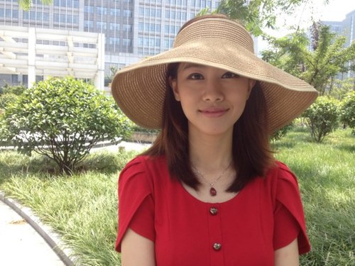 Anchor and journalist from Press Center of Nanjing TV Station, Jiang Su Province, CHINA
