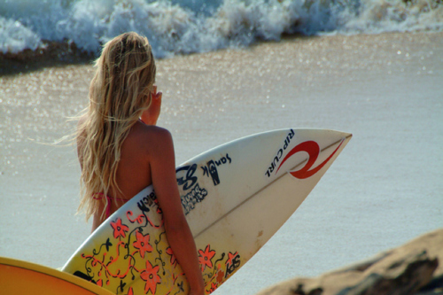 blonde, bronzed and buzzed. living it up on long island. save a whistle blow a lifeguard.