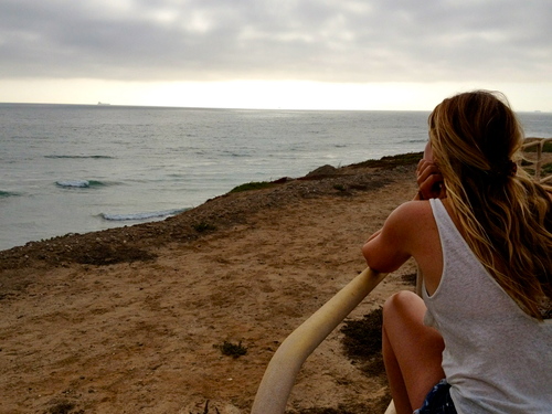Look for the girl with the sun in her eyes.