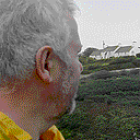 Artist producing watercolour/pastel landscapes of the Welsh coast.