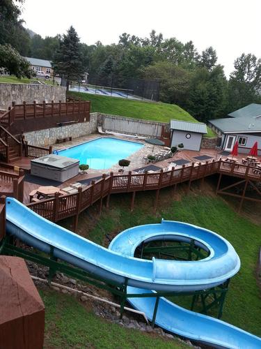 We like getting families together. Come stay at our 150 acre private resort in the NC mountains! We have a water slide, arcade, tennis, basketball, hiking...