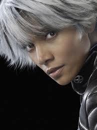 Ororo Monroe is the descendant of an ancient line of African priestesses, all of whom have white hair, blue eyes, and the potential to wield magic.