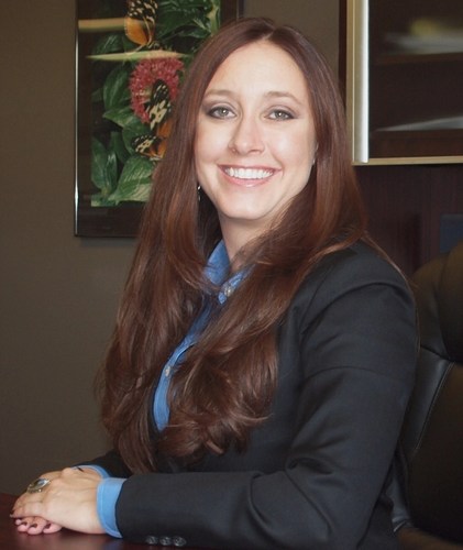 immigration attorney, public defender, lady boss lawyer employing a kick ass crew, dragon slayer, badass