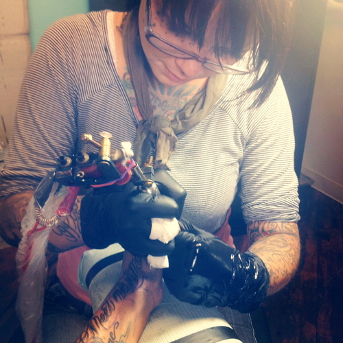 Stephanie Lane, tattoo artist at Honest to Goodness Tattoo! To book an appointment call 434-964-7679
