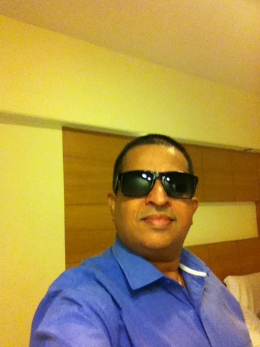 Well traveled, nature lover, good cook, love to play sitar, paint to de stress, kinda romantic guy, liberated, spiritual, intense, care free....what else ...