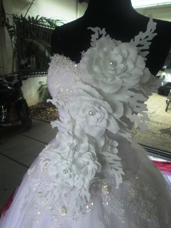 wedding gowns and entourage supplier.formal gowns,uniforms,costumes and casual dresses maker