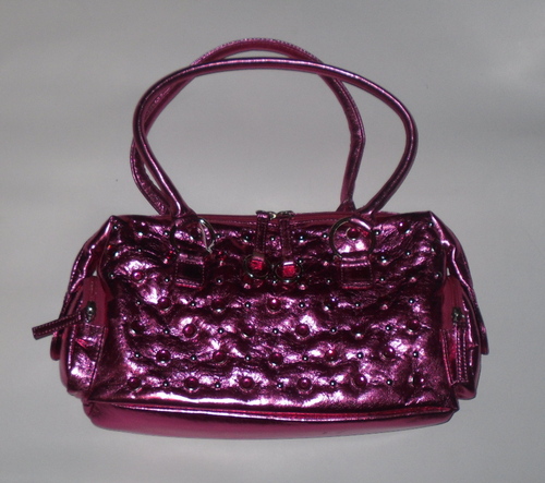 NewFashionPurse's profile picture. New Fashion Purses Carries Clothes Purses and Shoe. We also offer custom Designed Clothes with in house design, Embroidery and Silk Screening