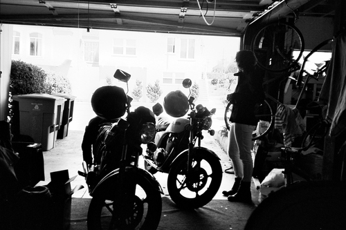 sassy frassy lassie. motos and surfboards are preferred modes of transportation. freelance producer