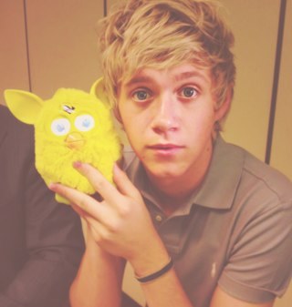 1Dcorkers's profile picture. We are two crazy, decicated directioners who laugh at EVERYTHING but... YOLO!  haha fluffy hat man!